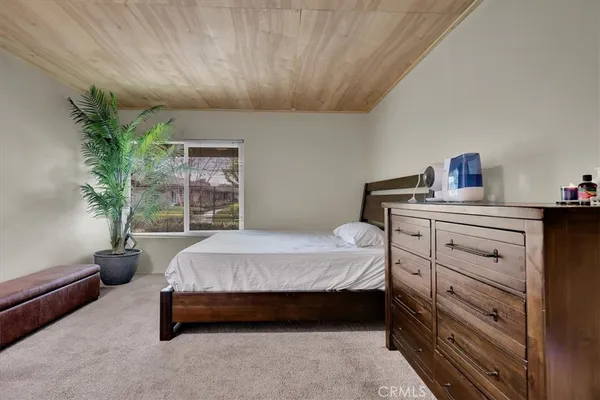 a patio with a patio table and chairs