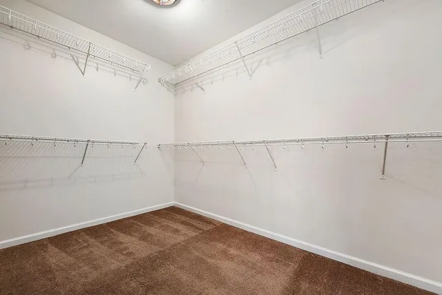 a view of a room with racks on the wall