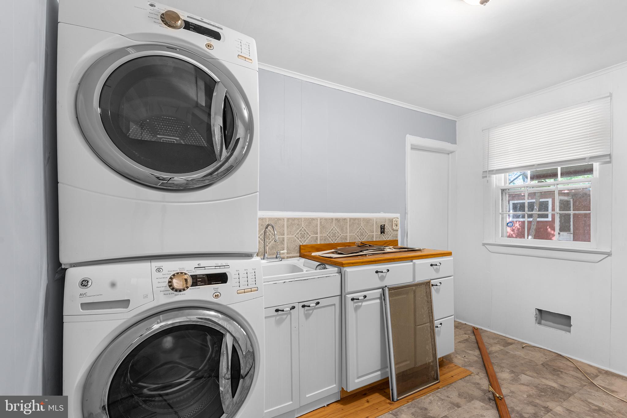 98 Spruce Lane Pine Hill, NJ 08021 - Photo 13 of 28 a view of a kitchen with washer and dryer