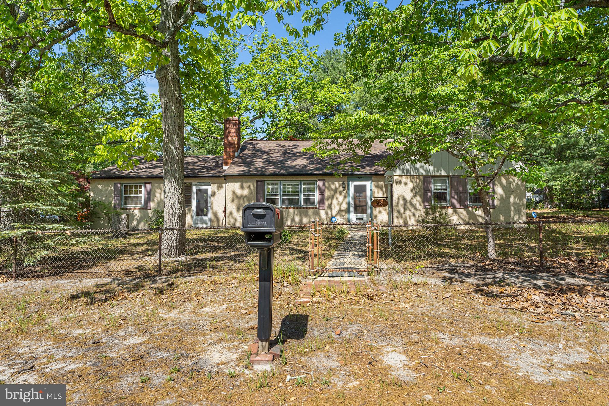 98 Spruce Lane Pine Hill, NJ 08021 - Photo 3 of 28 a front view of a house with garden