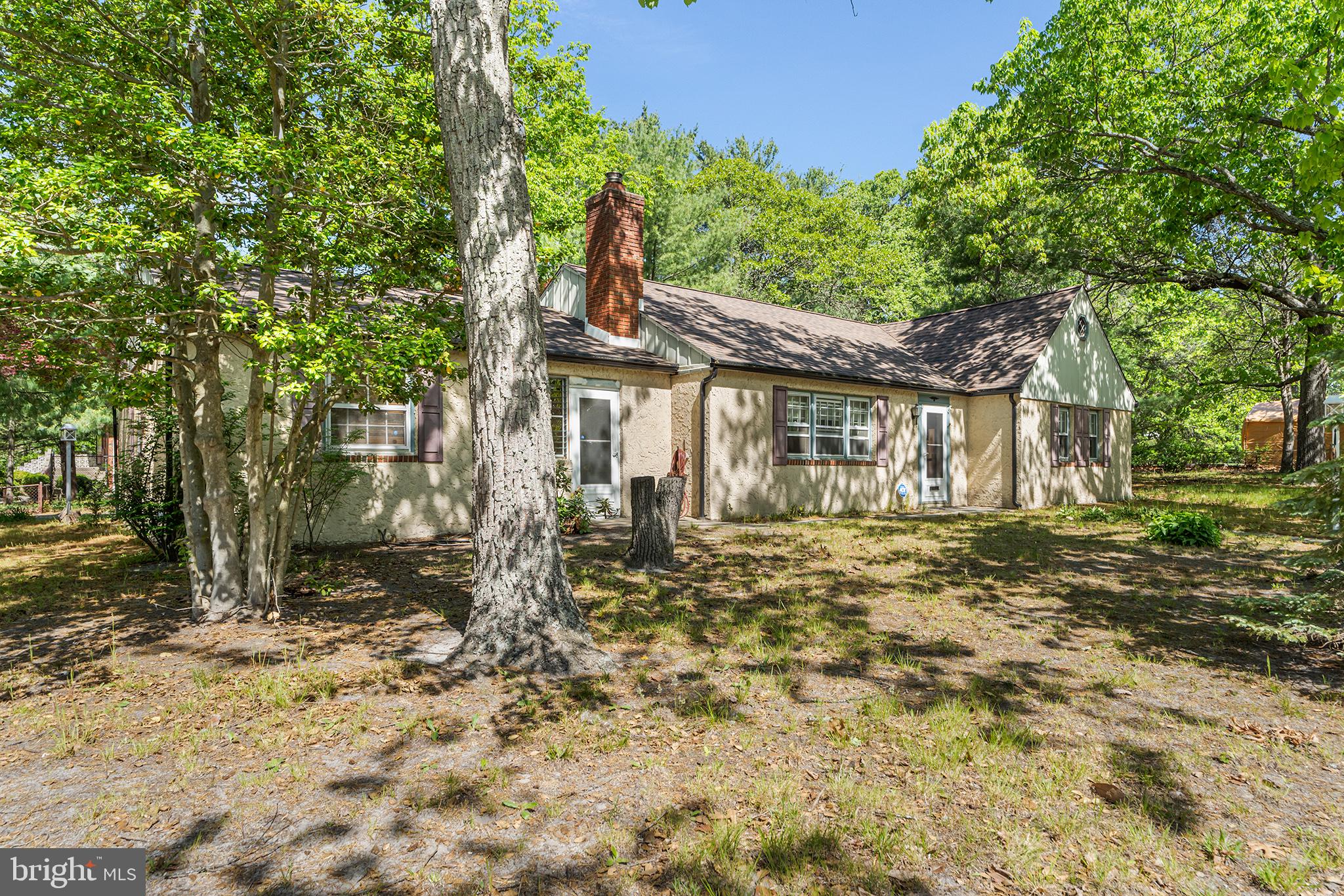 98 Spruce Lane Pine Hill, NJ 08021 - Photo 6 of 28 a front view of a house with a garden