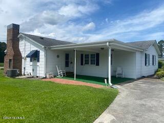 294 Pasture Branch Road Rose Hill, NC 28458 - Photo 5 of 23 back of home showing covered patio