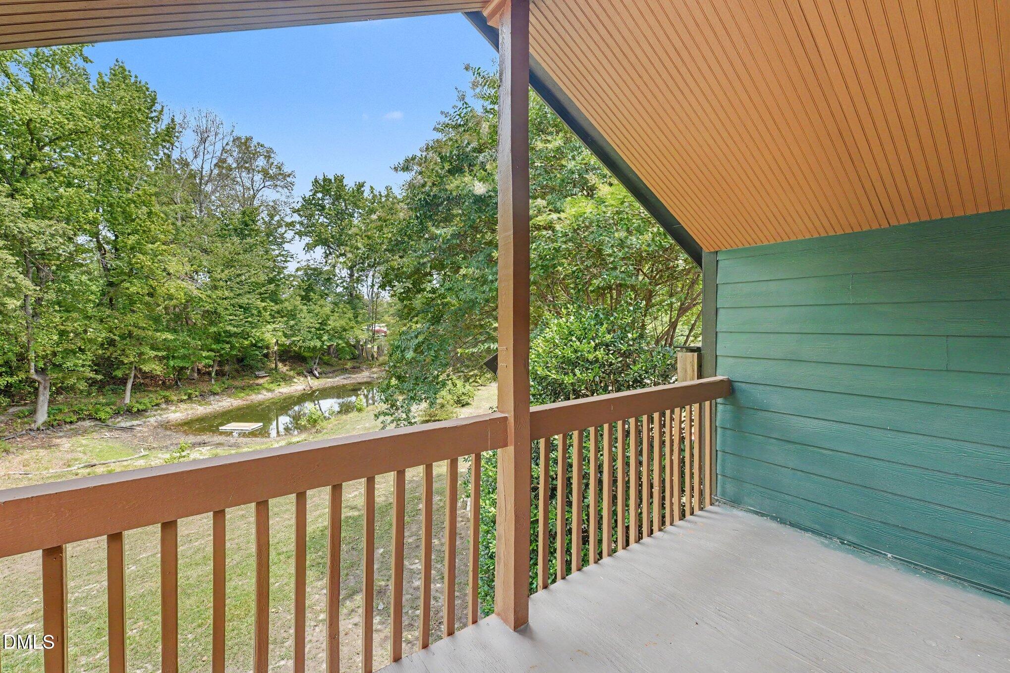 7704 Zebulon Road Youngsville, NC 27596 - Photo 26 of 41 Covered Balcony