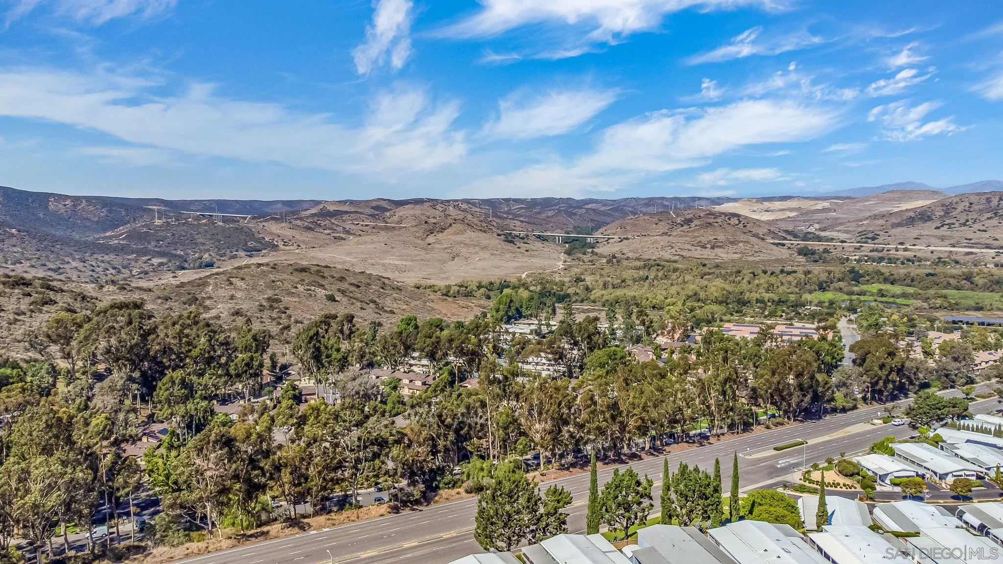 7467 Mission Gorge Road, Unit SPC 291 Santee, CA 92071 - Photo 32 of 40 a view of a city with mountains in the background