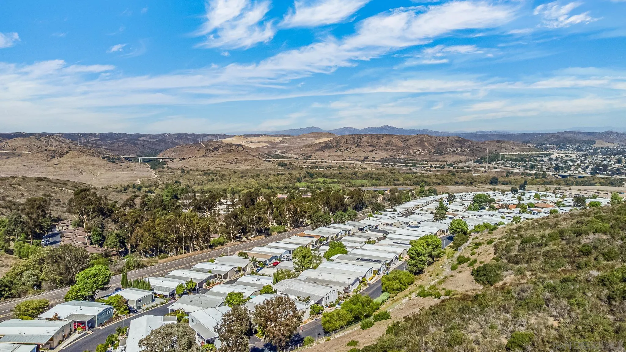 7467 Mission Gorge Road, Unit SPC 291 Santee, CA 92071 - Photo 4 of 40 an aerial view of residential building with yard