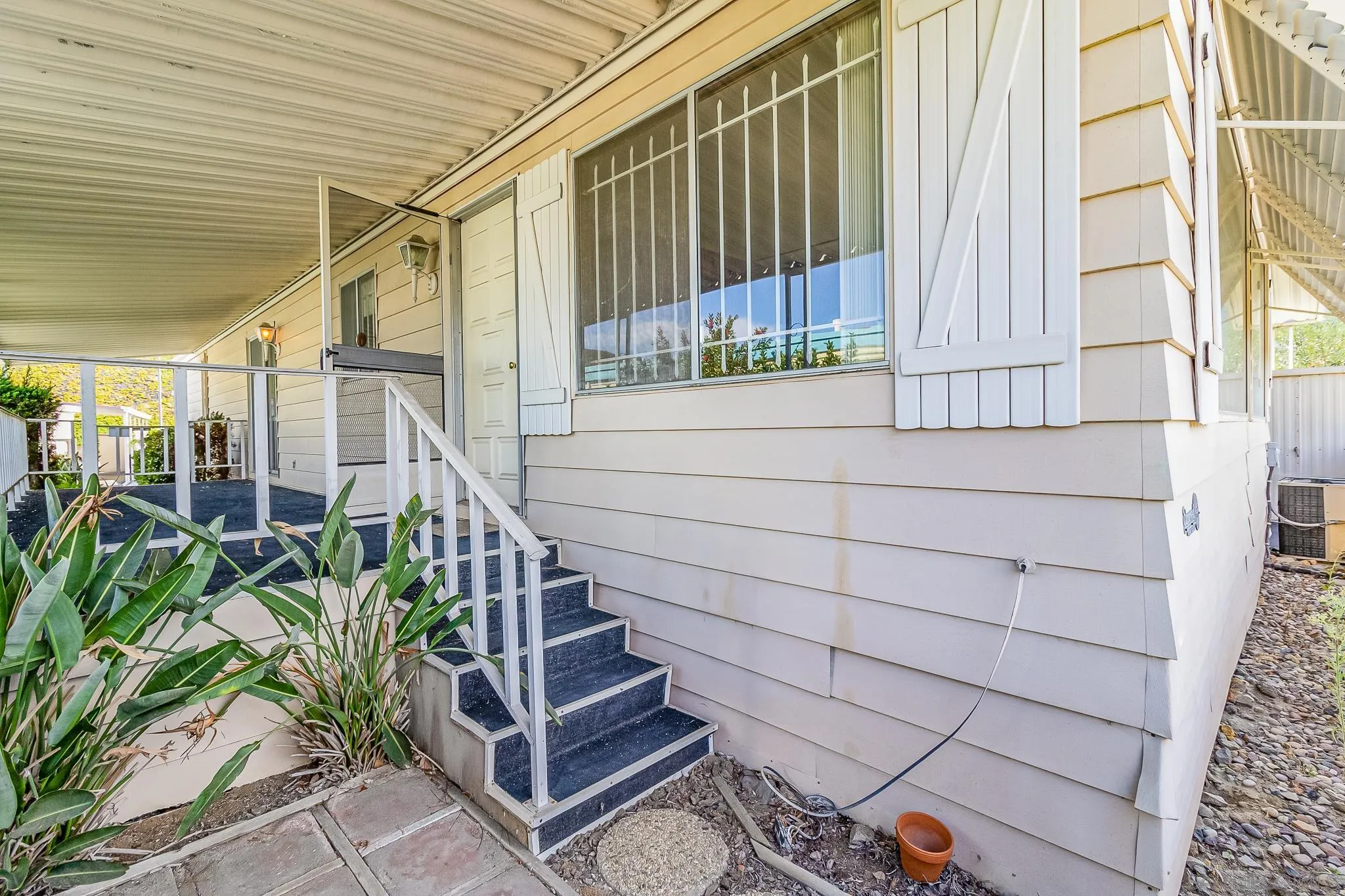 7467 Mission Gorge Road, Unit SPC 291 Santee, CA 92071 - Photo 7 of 40 a view of entryway with wooden floor and stairs