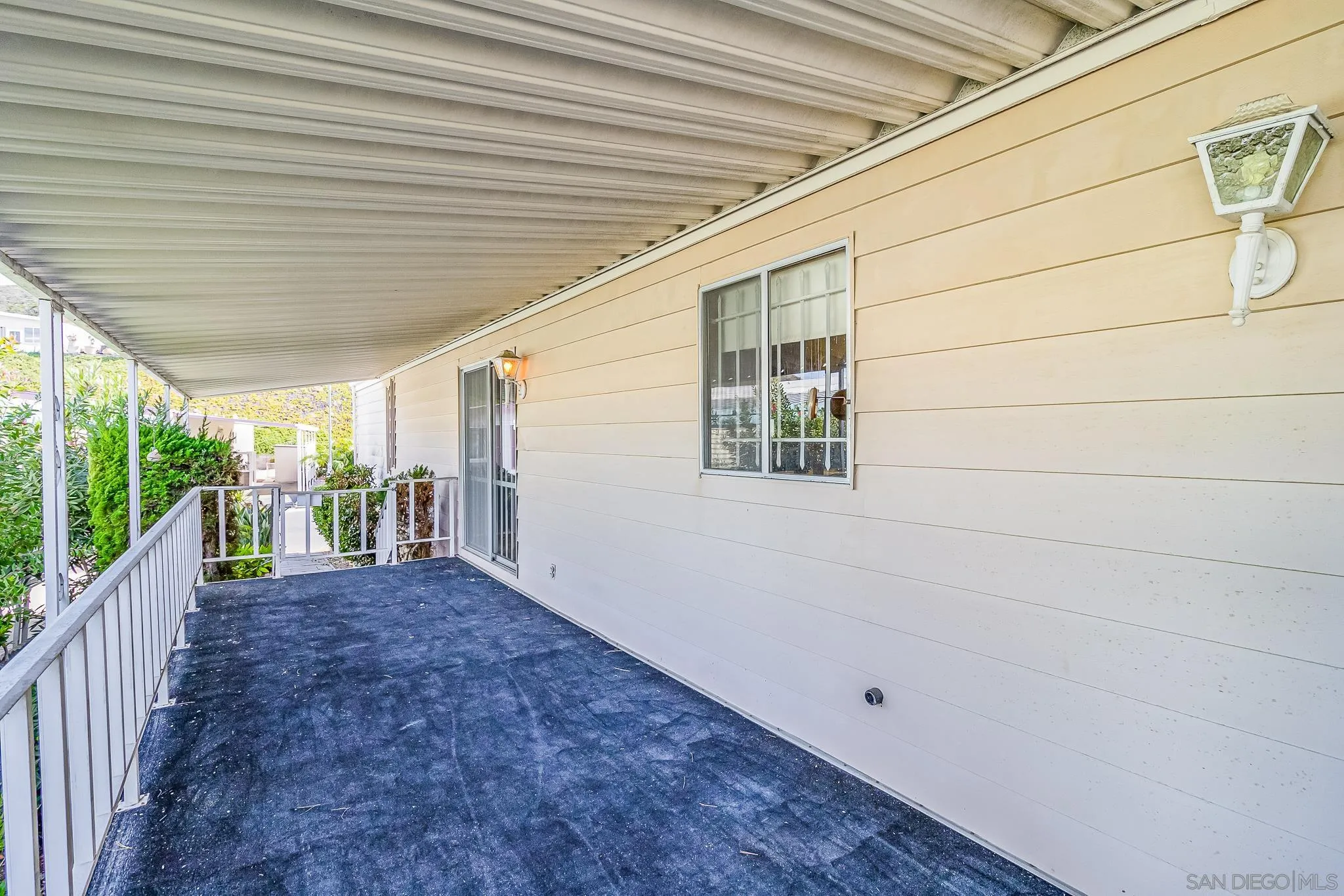 7467 Mission Gorge Road, Unit SPC 291 Santee, CA 92071 - Photo 9 of 40 a view of a porch