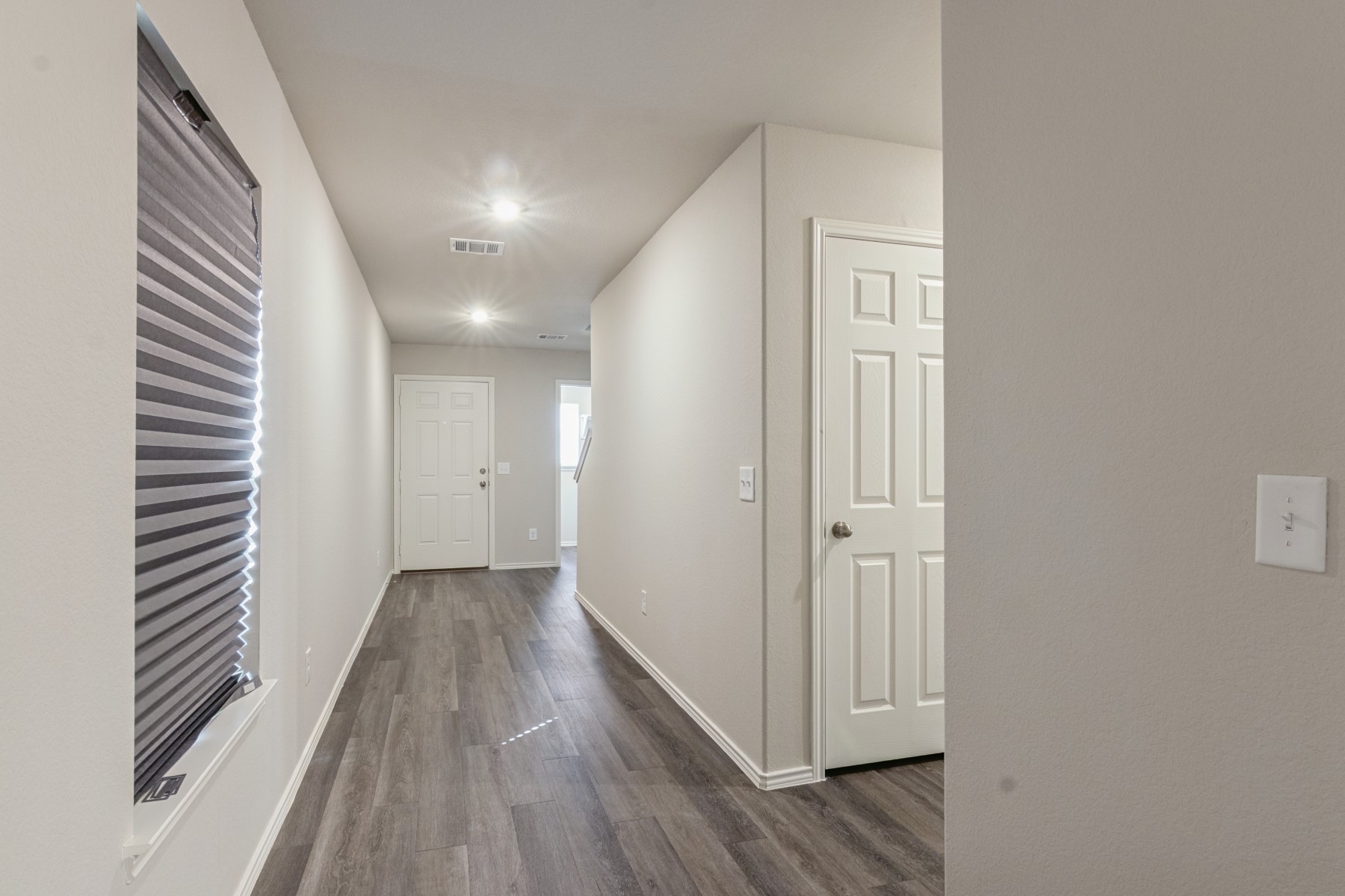 2250 Yelverton Ter Trail Spring, TX 77373 - Photo 6 of 30 a view of a hallway with wooden floor