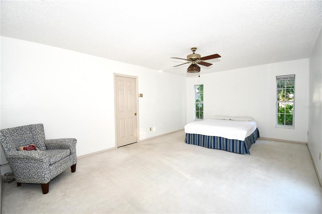 611 Old Eustis Road Mount Dora, FL 32757 - Photo 21 of 45 a living room with furniture and a window