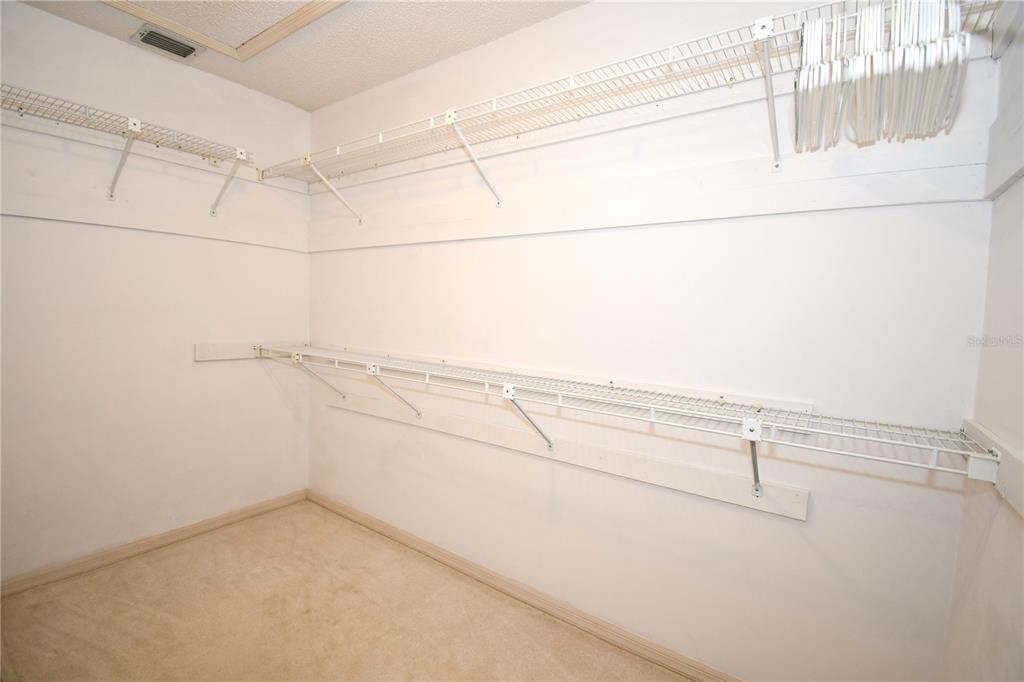 611 Old Eustis Road Mount Dora, FL 32757 - Photo 26 of 45 a view of a room with racks on the wall