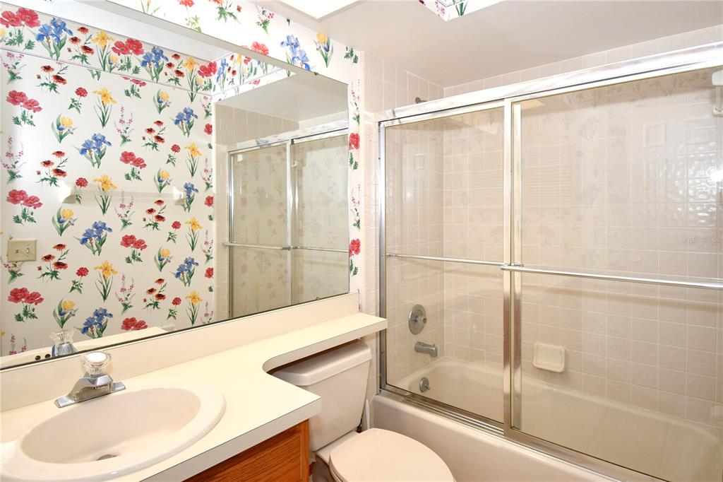 611 Old Eustis Road Mount Dora, FL 32757 - Photo 29 of 45 a bathroom with a sink toilet and shower