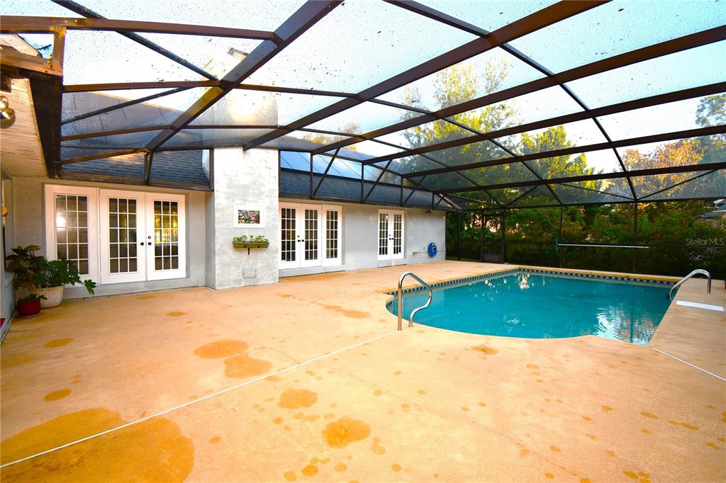 611 Old Eustis Road Mount Dora, FL 32757 - Photo 35 of 45 a view of a backyard with a backyard and a garage