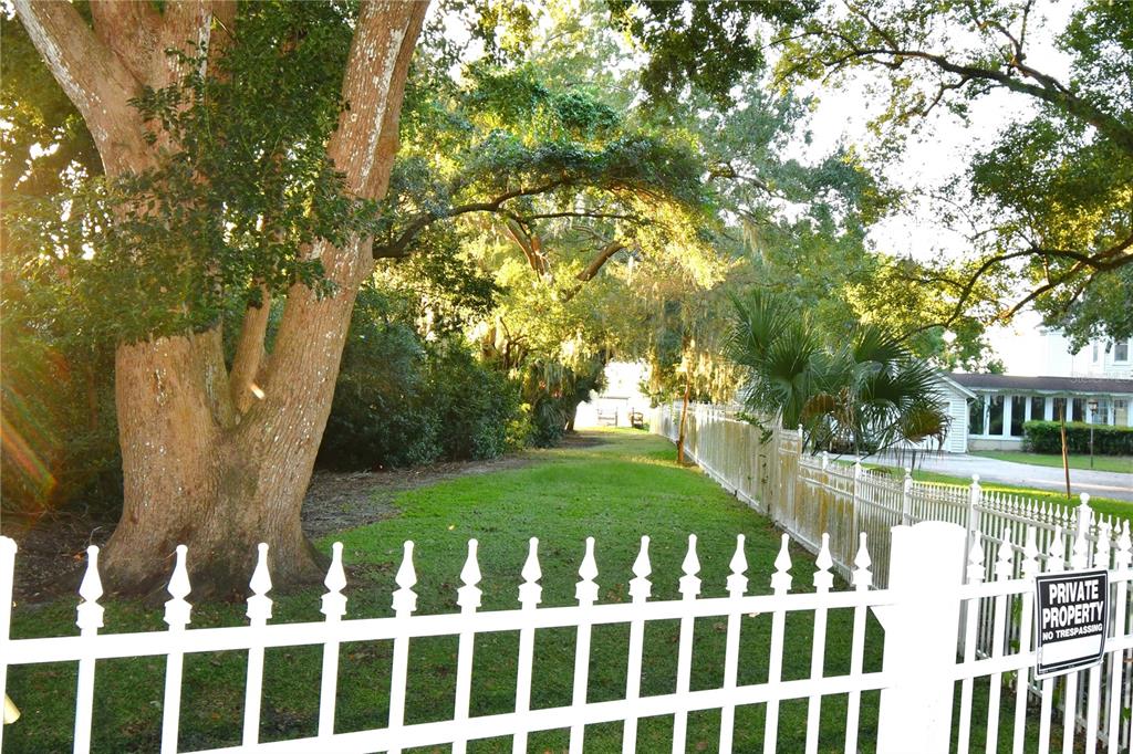 611 Old Eustis Road Mount Dora, FL 32757 - Photo 8 of 45 a view of a house with a yard