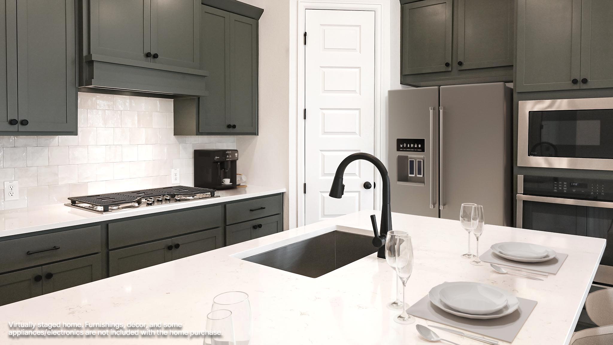 3921 Melody Road Lockhart, TX 78644 - Photo 3 of 30 a kitchen with a sink and white appliances