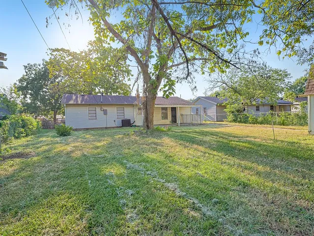 a house view with a garden space