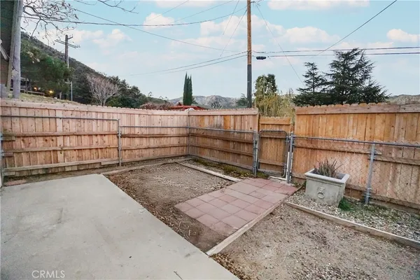 a view of outdoor space with wooden deck