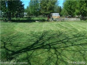 61724 Rambling Way South Lyon, MI 48178 - Photo 28 of 29 Rambling way large fenced yard.jpg