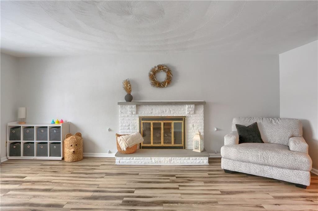 9652 Shirley Drive Allison Park, PA 15101 - Photo 3 of 49 a living room with furniture and a fireplace