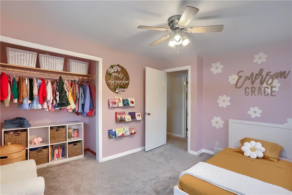 9652 Shirley Drive Allison Park, PA 15101 - Photo 37 of 49 a bedroom with a bed cabinets and book shelf