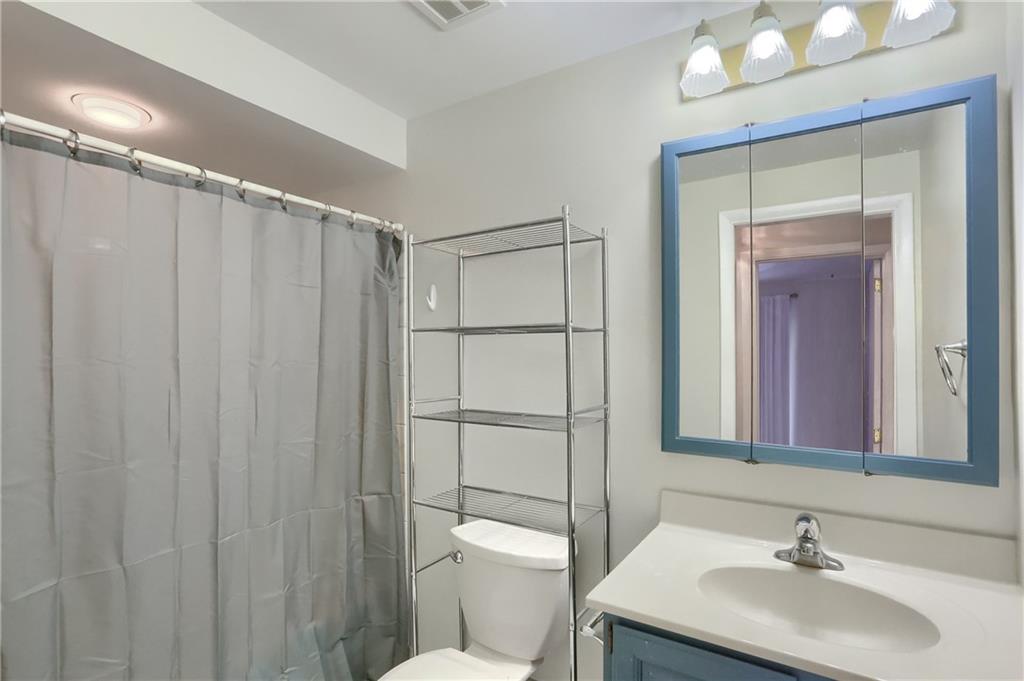 9652 Shirley Drive Allison Park, PA 15101 - Photo 41 of 49 a bathroom with a sink a toilet and shower