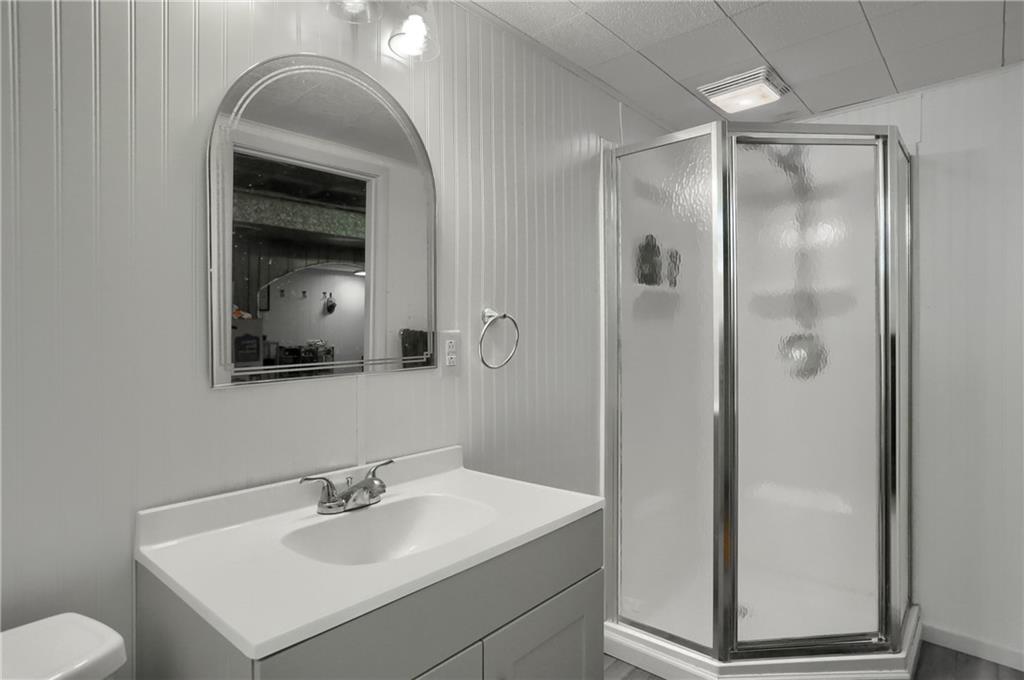 9652 Shirley Drive Allison Park, PA 15101 - Photo 45 of 49 a bathroom with a sink a toilet and shower