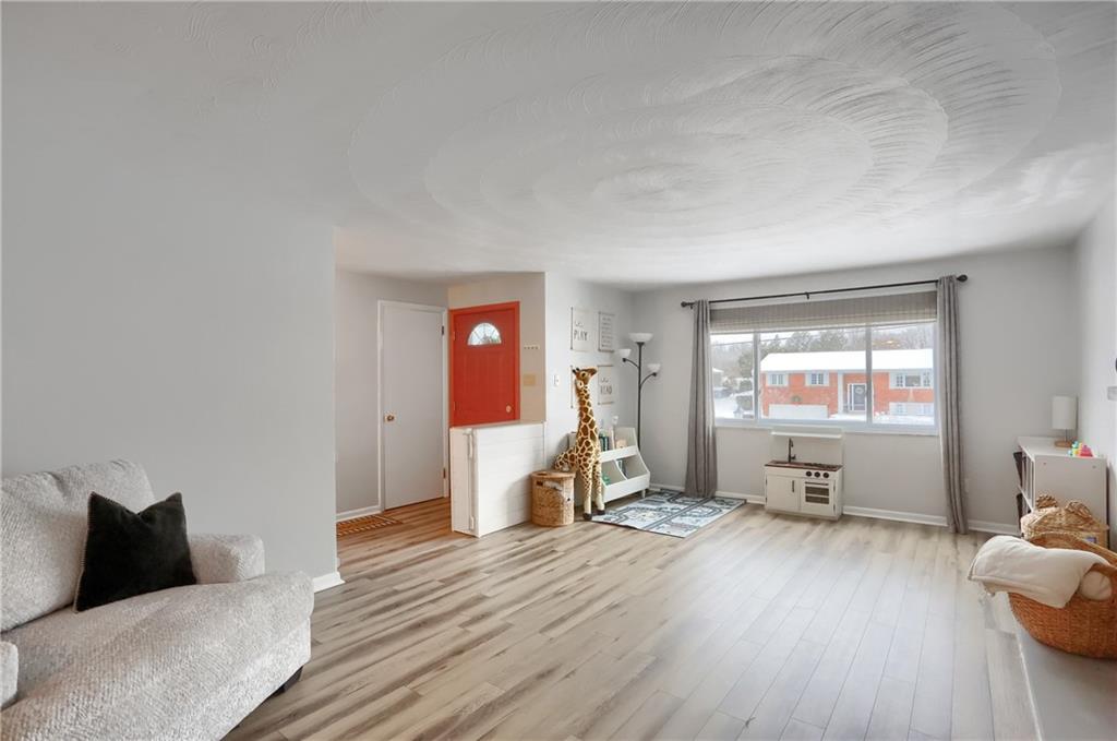 9652 Shirley Drive Allison Park, PA 15101 - Photo 7 of 49 a living room with furniture and a wooden floor