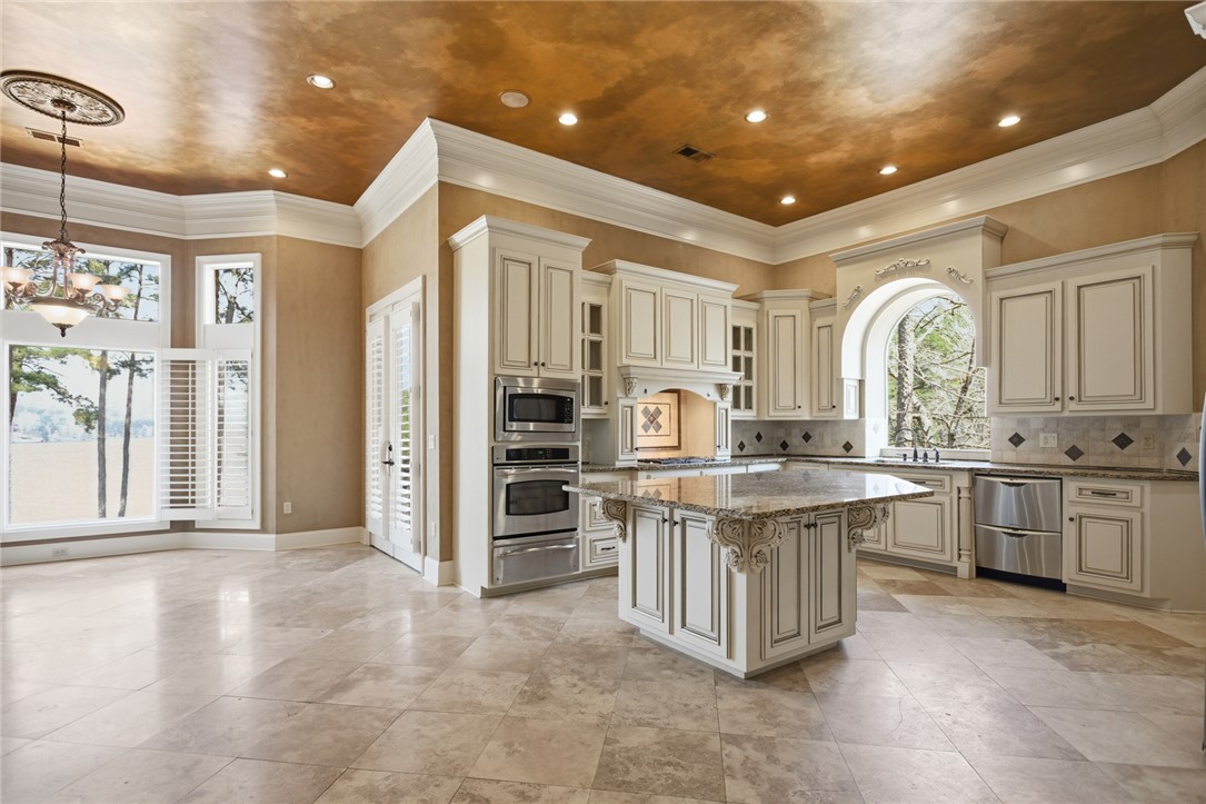 610 Highridge Drive Seneca, SC 29672 - Photo 15 of 50 This spacious kitchen offers ample room for culinary endeavors and entertaining.