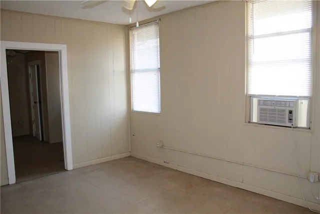 an empty room with windows