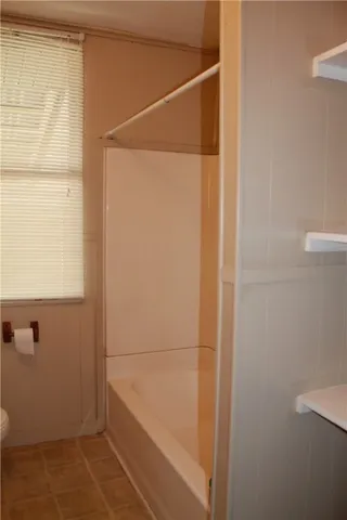a bathroom with a bathtub