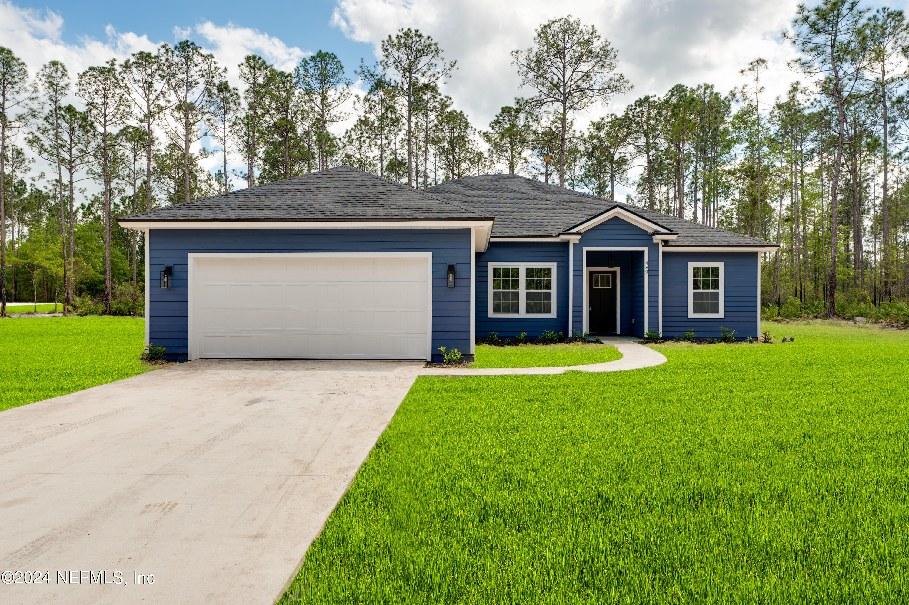 489 Kay Road Middleburg, FL 32068 - Photo 1 of 36 a front view of house with yard and green space