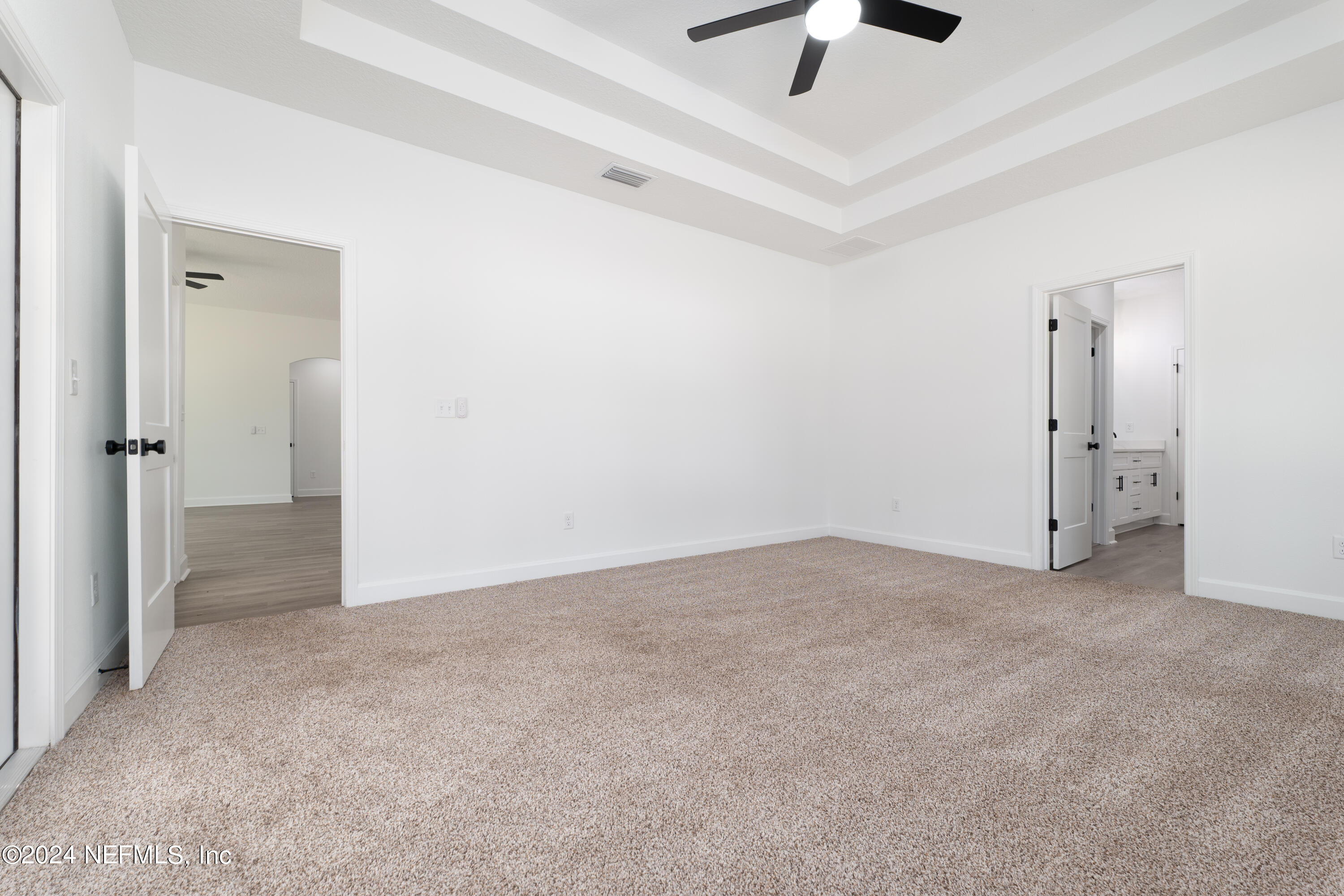 489 Kay Road Middleburg, FL 32068 - Photo 20 of 36 an empty room with a ceiling fan