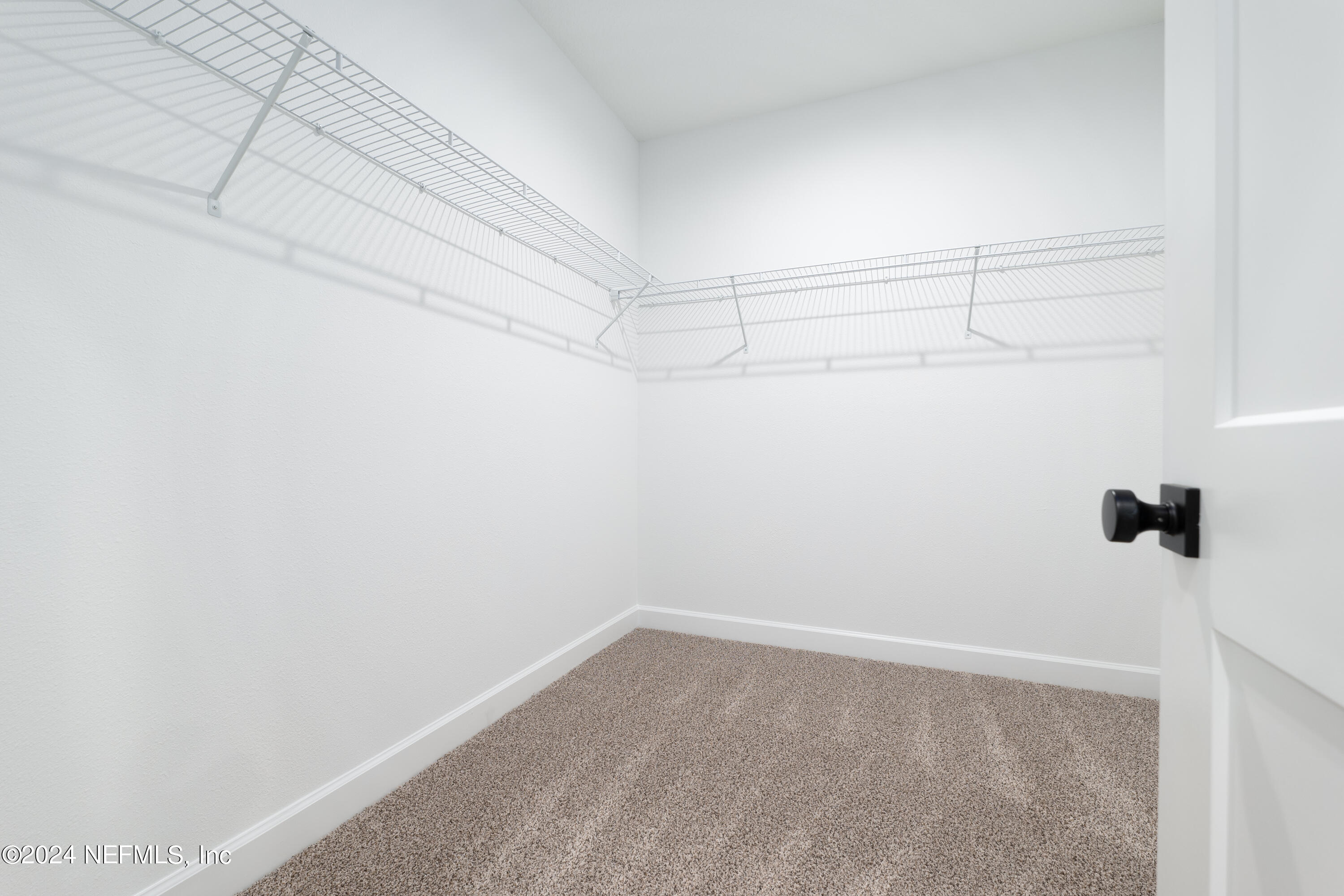 489 Kay Road Middleburg, FL 32068 - Photo 24 of 36 a view of a room with racks on the wall