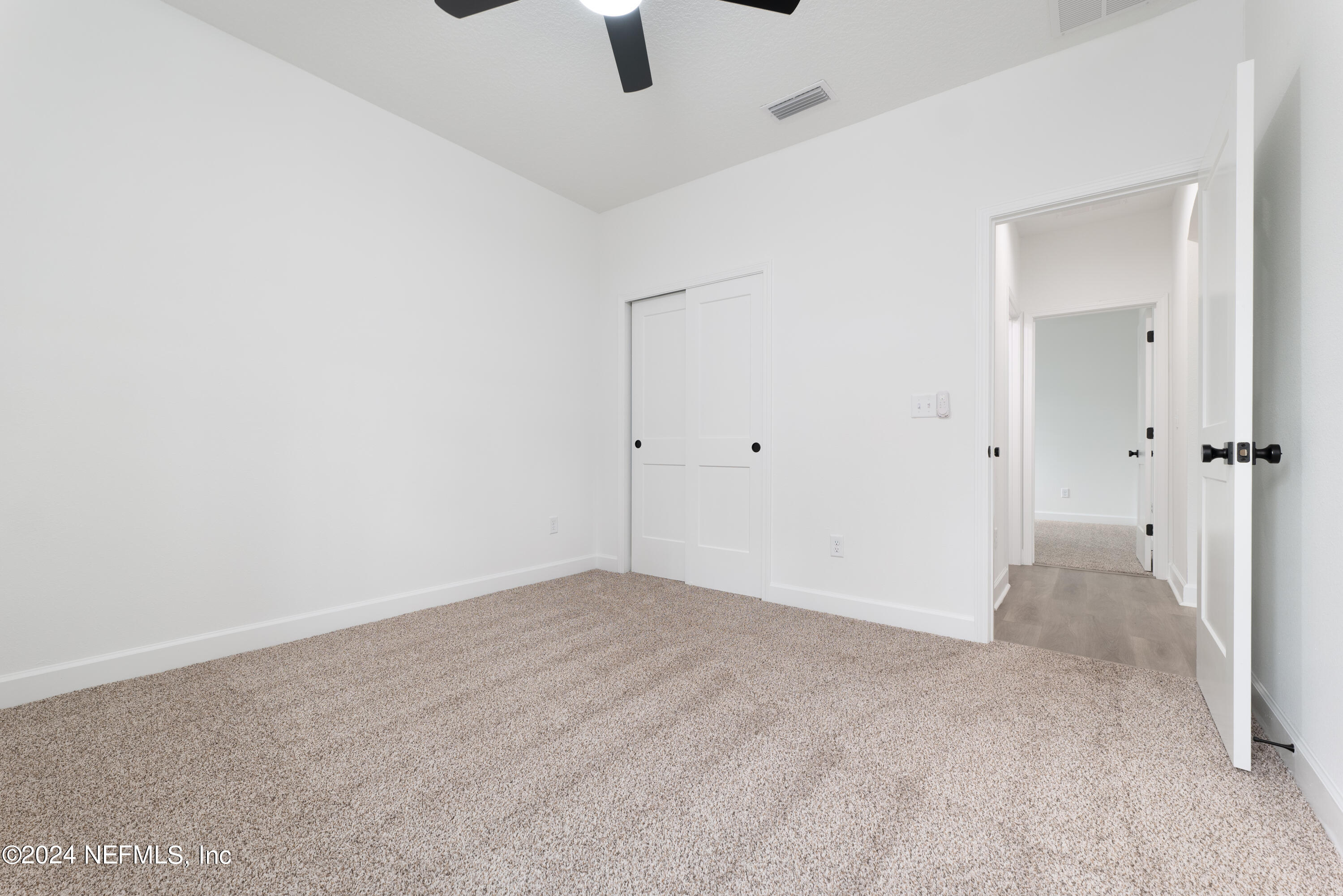 489 Kay Road Middleburg, FL 32068 - Photo 27 of 36 an empty room with fan