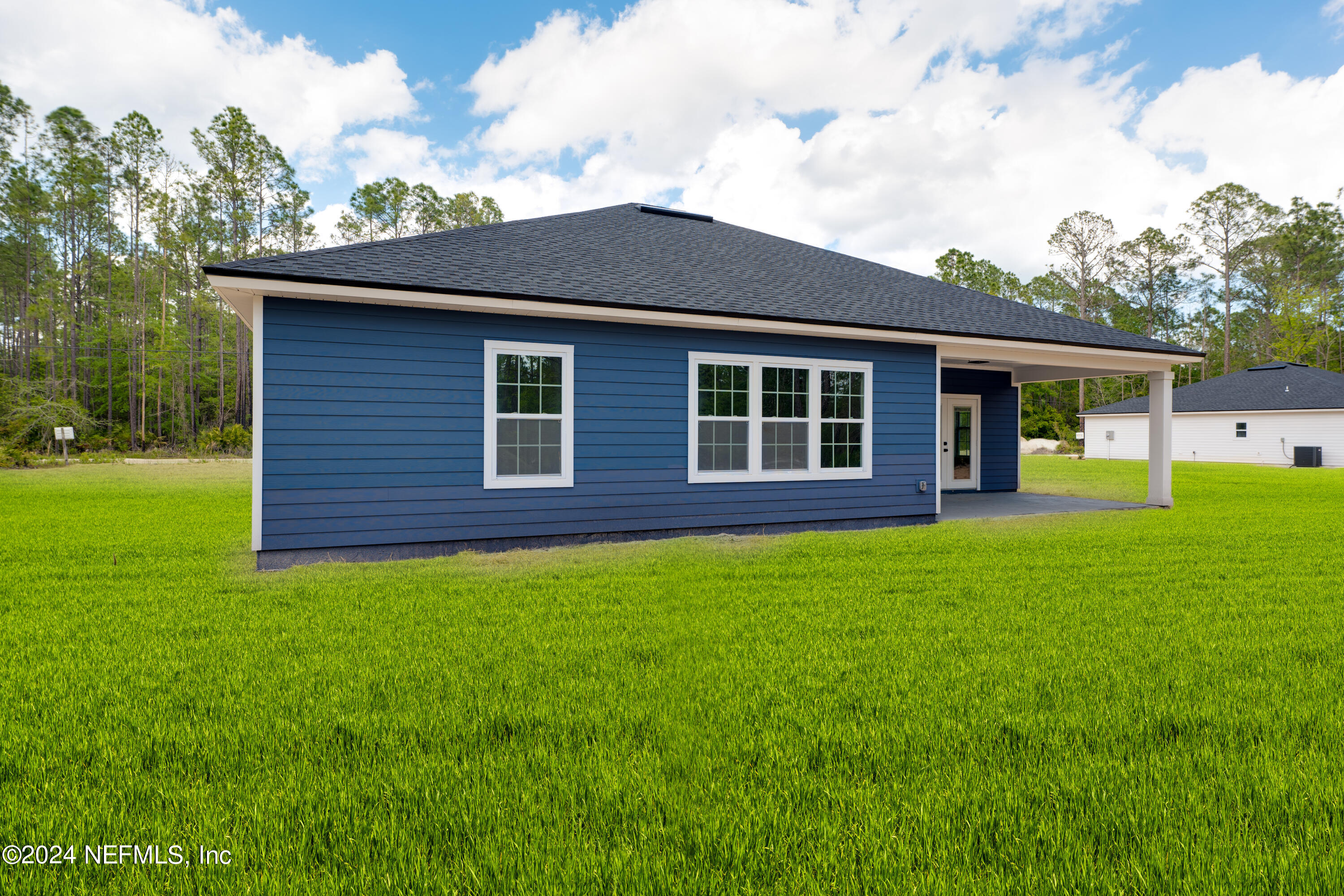 489 Kay Road Middleburg, FL 32068 - Photo 36 of 36 a view of a house with yard and front view of a house