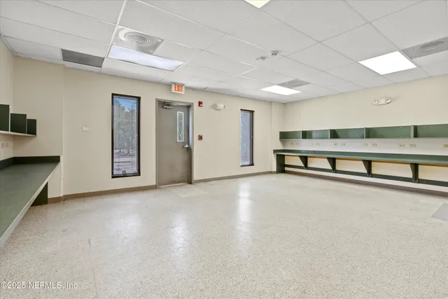 a view of a livingroom with furniture