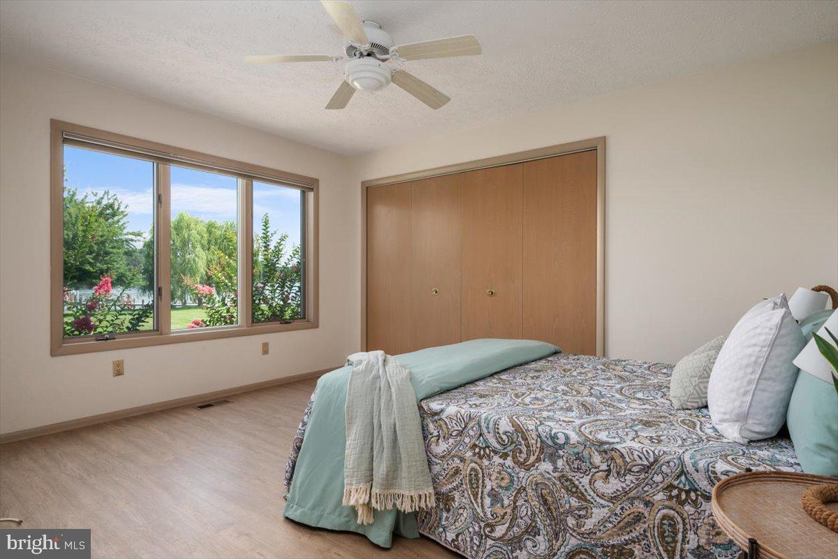 8122 Orchard Point Road Pasadena, MD 21122 - Photo 27 of 54 1st floor bedroom with water views