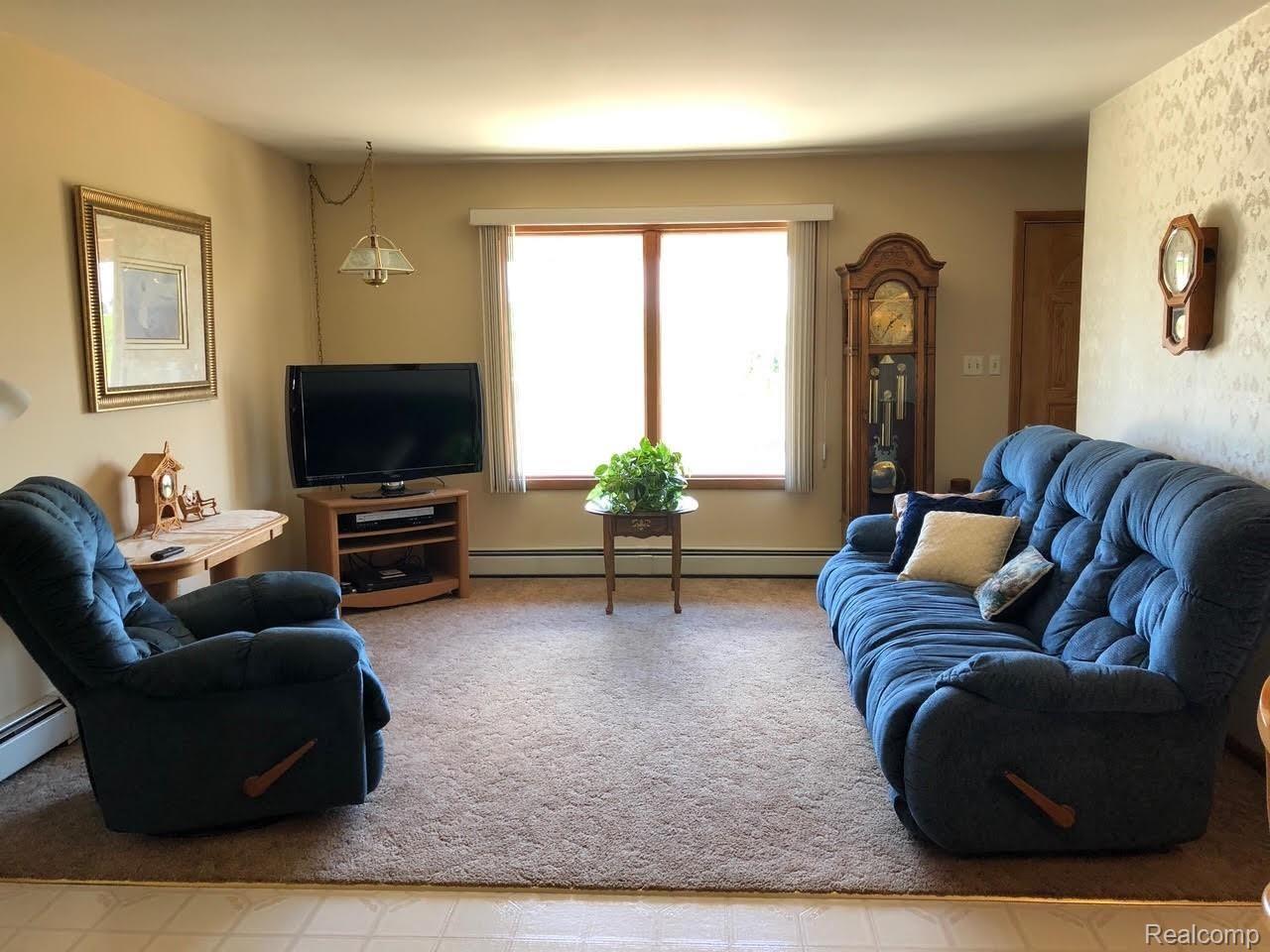 2121 Helena Road Bad Axe, MI 48413 - Photo 16 of 24 living room.jpg