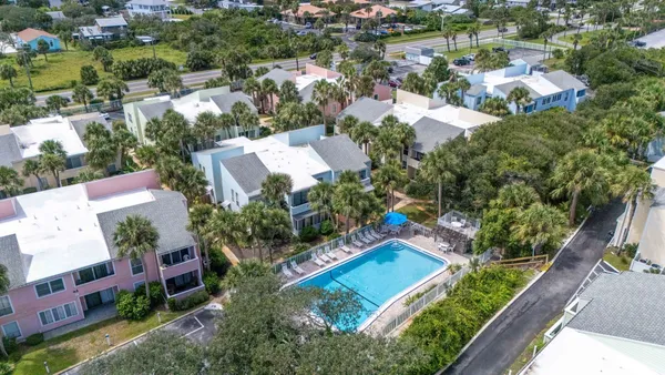 an aerial view of a house with a garden