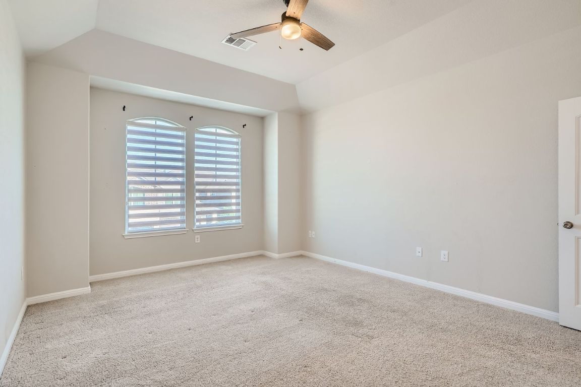 403 Epiphany Lane Pflugerville, TX 78660 - Photo 16 of 29 a view of an empty room with a window
