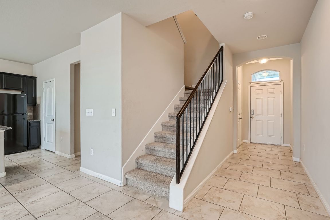 403 Epiphany Lane Pflugerville, TX 78660 - Photo 22 of 29 a view of a hallway view with staircase