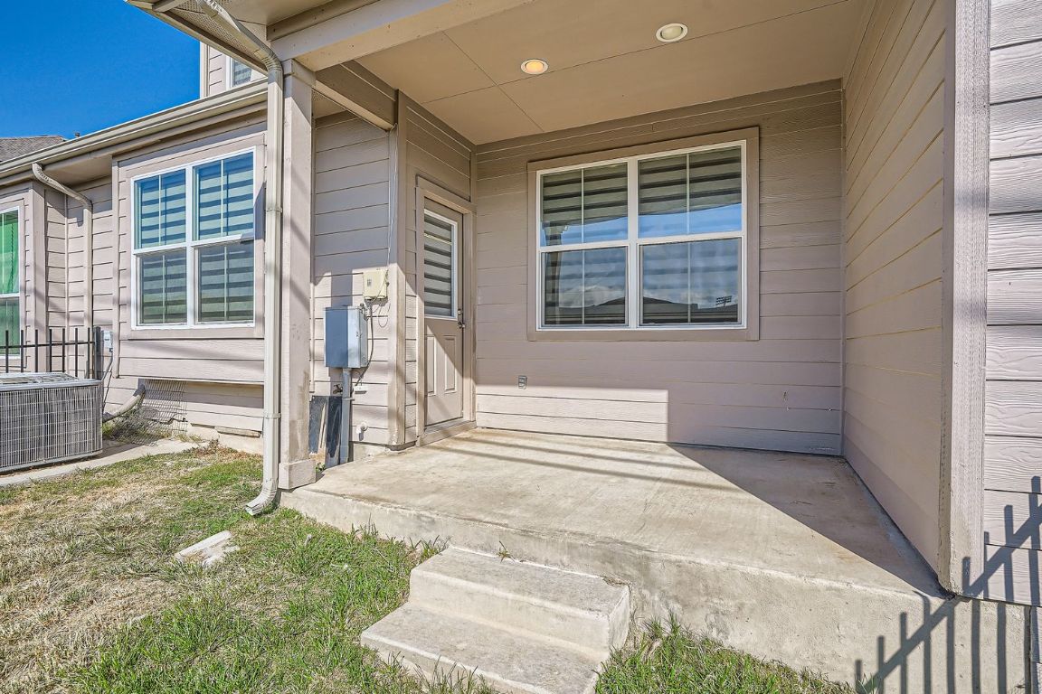 403 Epiphany Lane Pflugerville, TX 78660 - Photo 24 of 29 a front view of a house with a yard