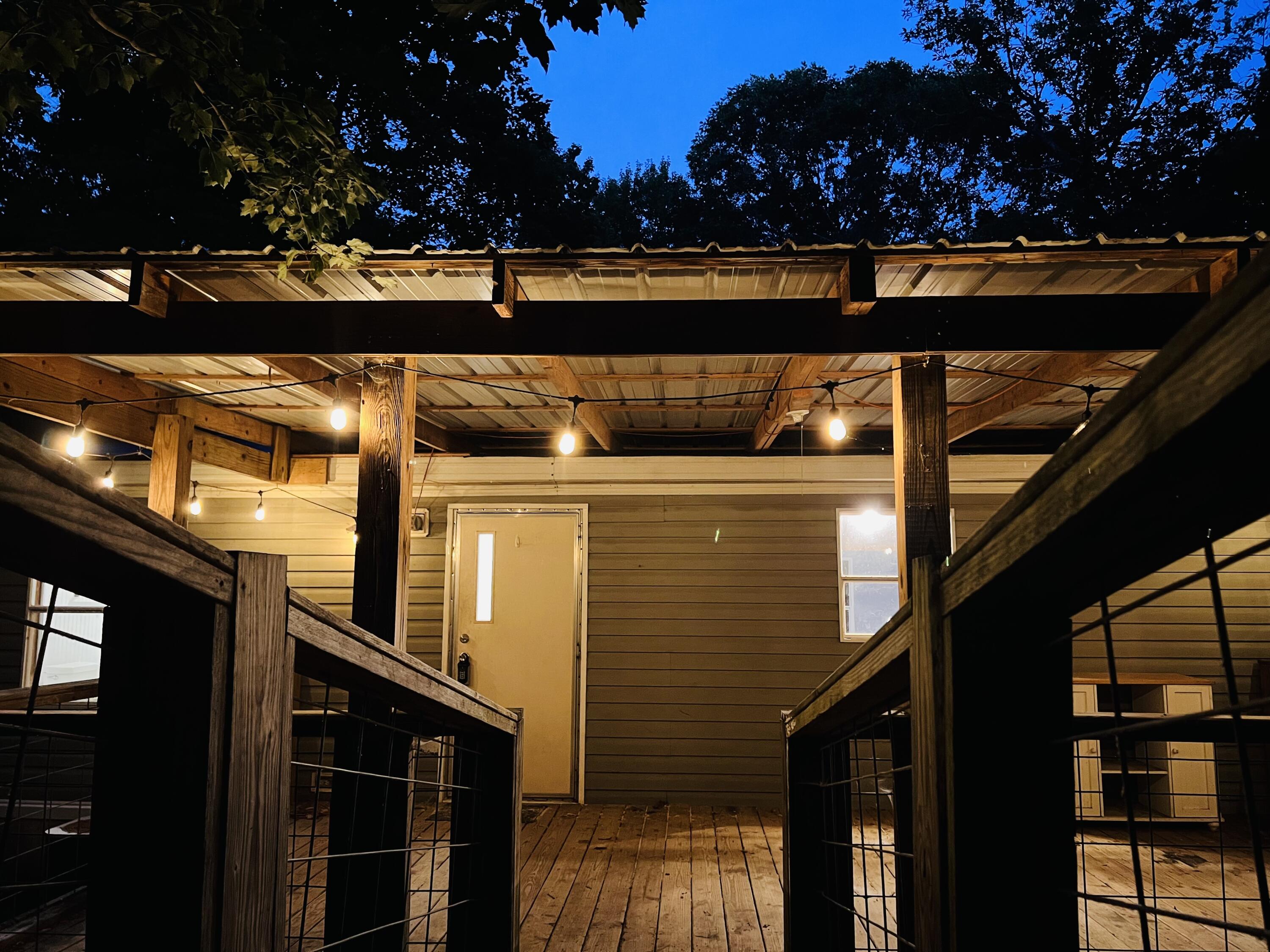 754 Dale Trail Menlo, GA 30731 - Photo 4 of 51 754 Dale Trail porch at dusk from ramp