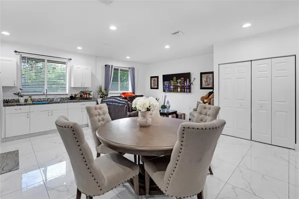 a view of a dining room with furniture