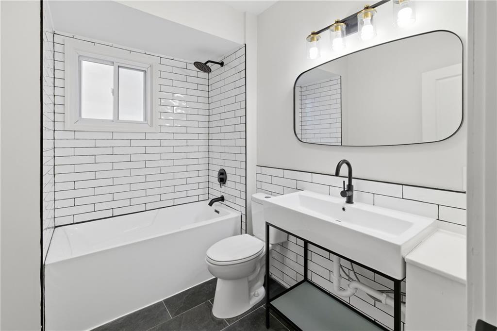 3 3rd Avenue Braddock, PA 15104 - Photo 12 of 46 a bathroom with a sink toilet and shower