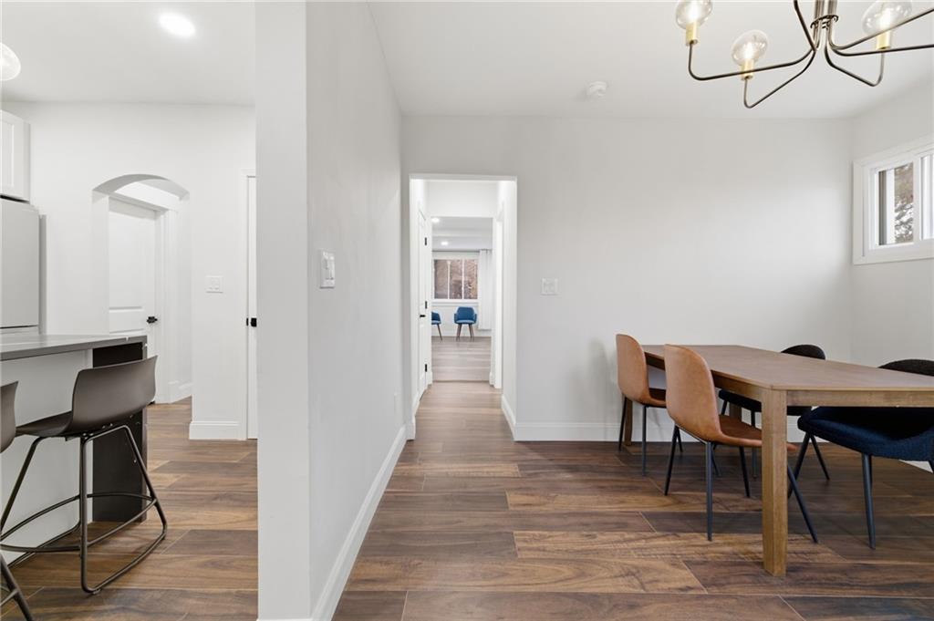 3 3rd Avenue Braddock, PA 15104 - Photo 16 of 46 a view of a workspace with furniture and wooden floor