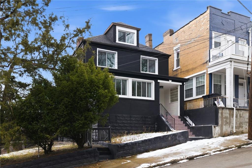 3 3rd Avenue Braddock, PA 15104 - Photo 2 of 46 a front view of a house with garden