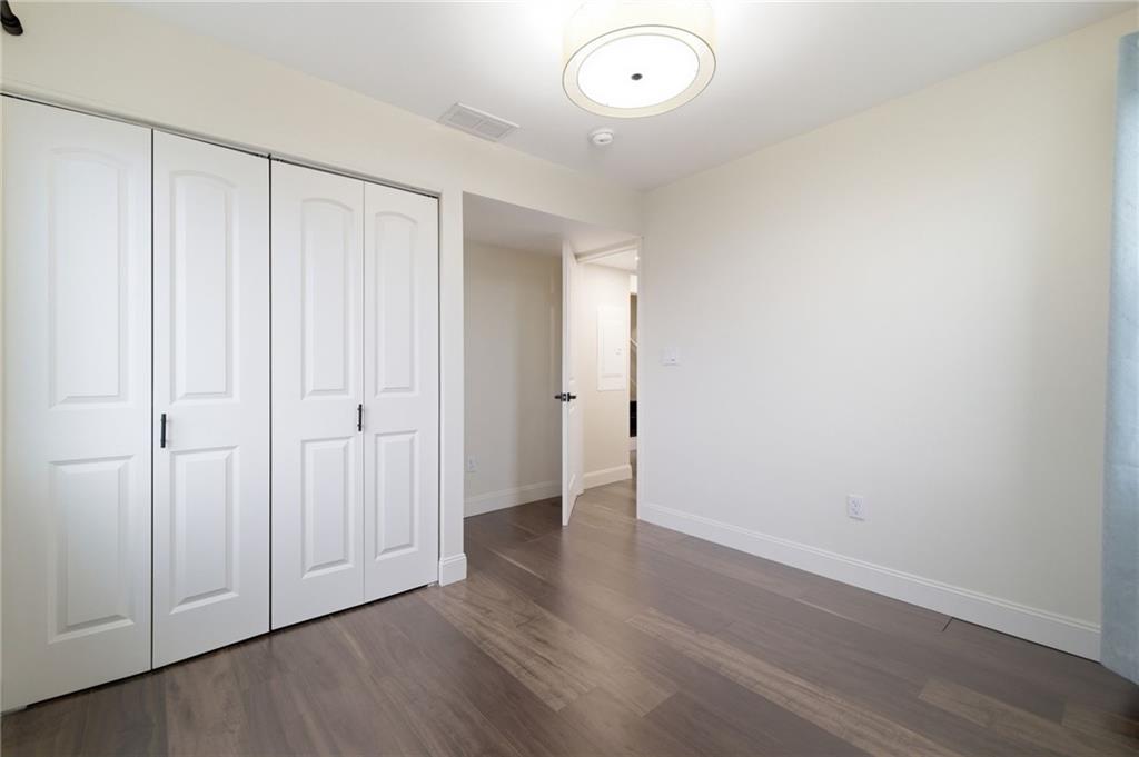 3 3rd Avenue Braddock, PA 15104 - Photo 25 of 46 an empty room with wooden floor