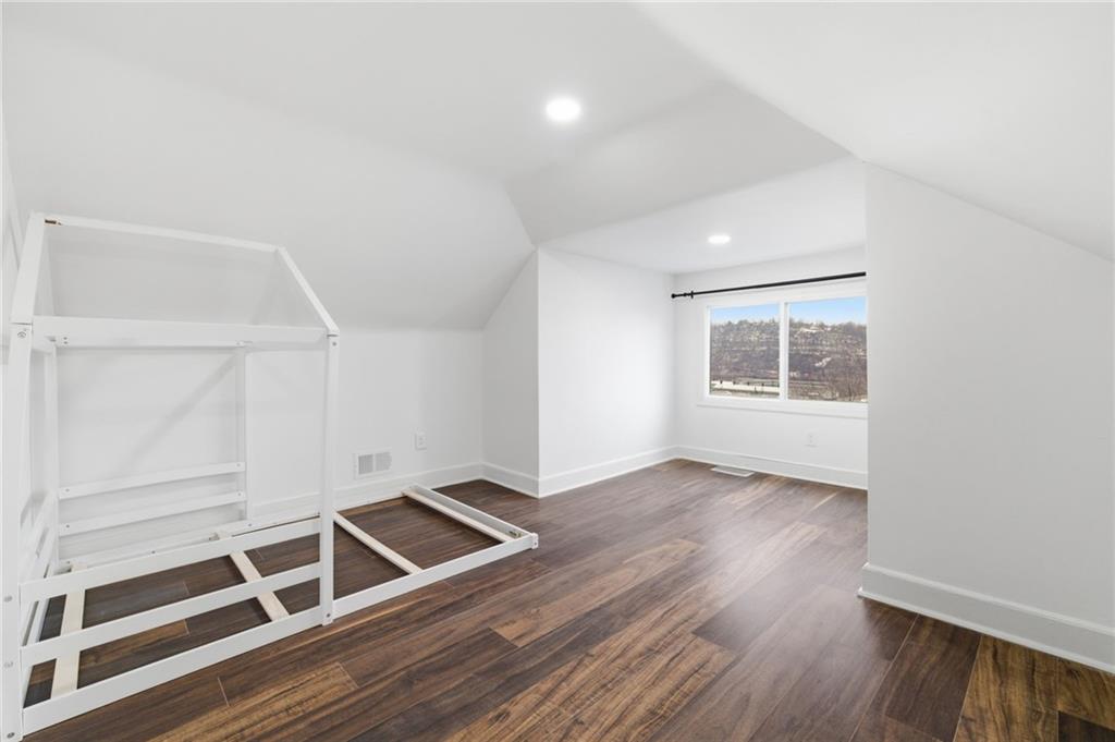 3 3rd Avenue Braddock, PA 15104 - Photo 32 of 46 an empty room with wooden floor and window