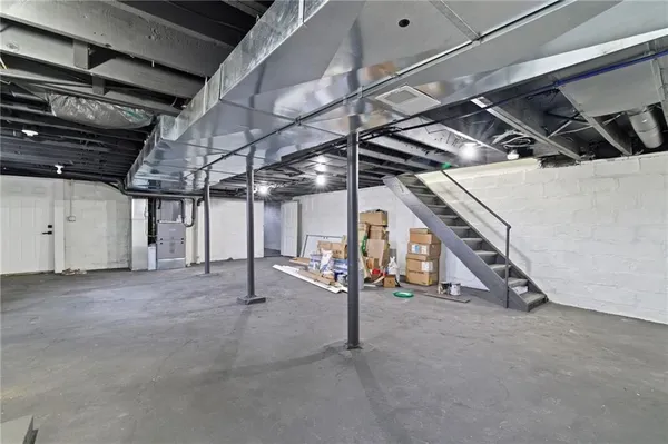 a view of an empty room with windows
