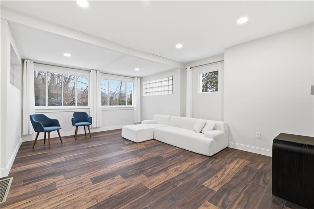 3 3rd Avenue Braddock, PA 15104 - Photo 9 of 46 a living room with furniture and a wooden floor